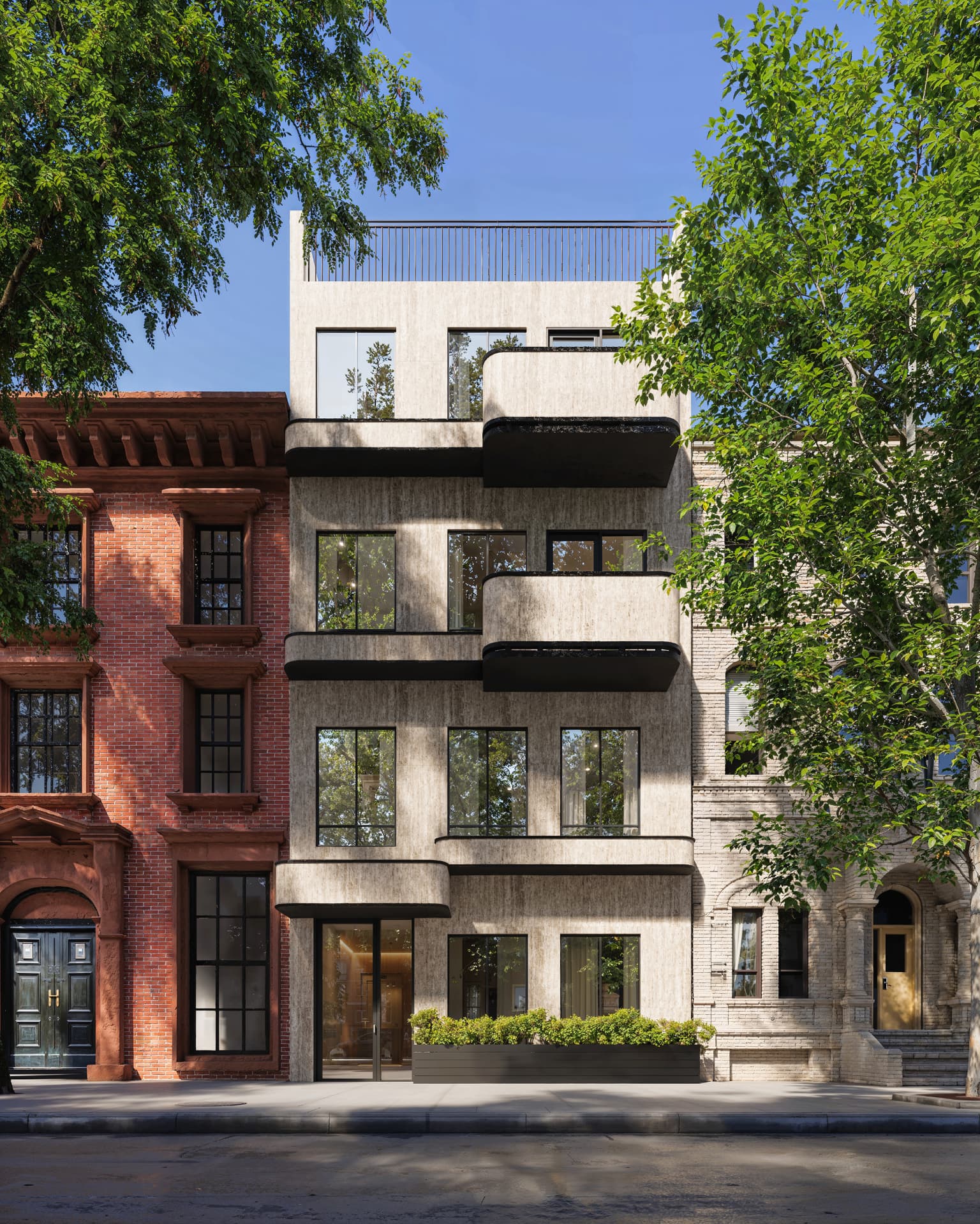 The travertine facade of 465 Hancock Street in Bedford-Stuyvesant, from rooftop terrace to entrance